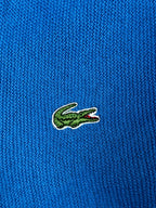 Blauer Vintage Lacoste Pullover mit Krokodil-Logo in Größe L.