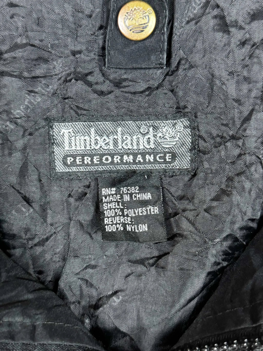 Timberland Fleecejacke mit Innenetikett, grau, Größe M, aus hochwertigem Fleece-Material.